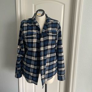 Thick, blue plaid flannel from Costco. Sturdy material will keep you warm.